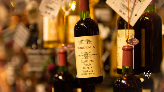 Depth Photography of Green Labeled Bottle