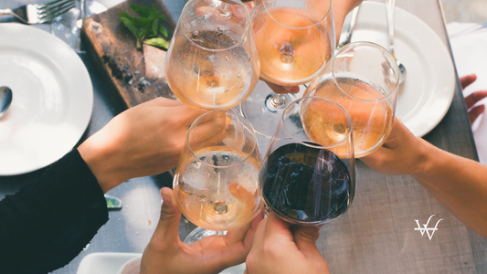 Group of People Holding Wine Glasses