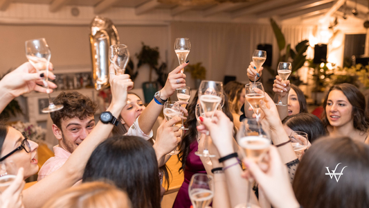 People Holding Wine Glasses