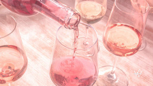 Rose wine pouring, toned image