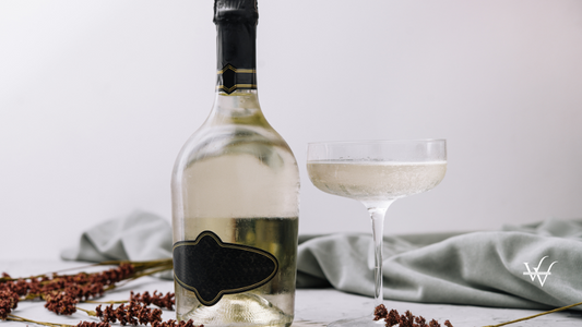 prosecco bottle with wine glass
