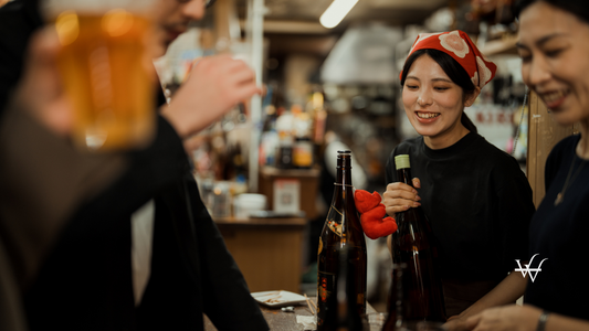Izakaya Staff Serving Drinks