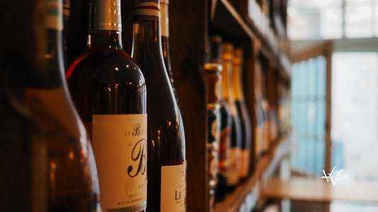Photo of wine bottles on rack