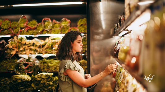 Woman Buying Groceries in a Supermarket