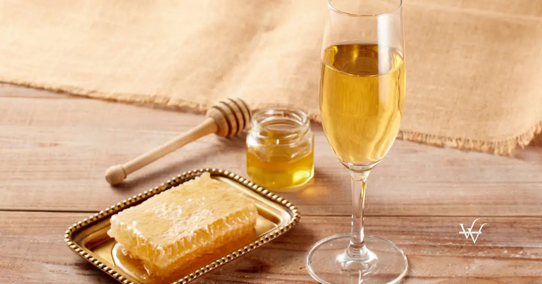 elegant presentation of honeycomb and honey with wine