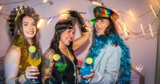 friends-celebrating-a-costume-party-at-home-with-cocktails